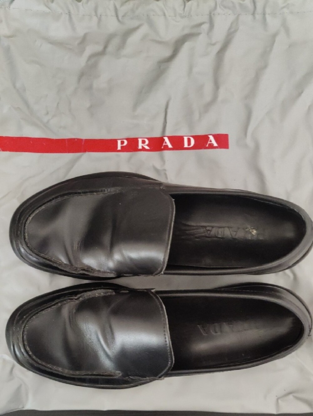 Authentic Prada Black Leather Penny Loafers For Women - Picture 9 of 10
